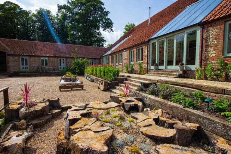 view of the length of the courtyard barns norfolk yoga retreat