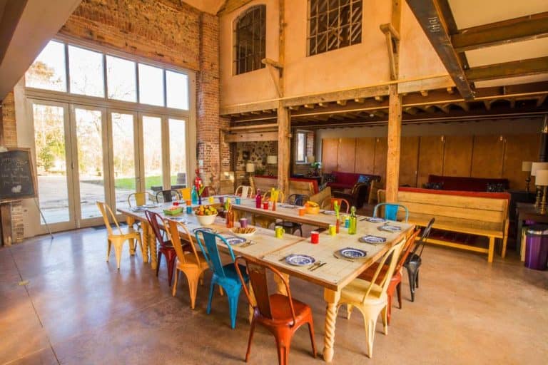 dining area colourful chairs large table norfolk yoga retreat