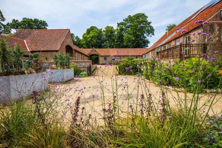 courtyard in spring with flowers norfolk yoga retreat