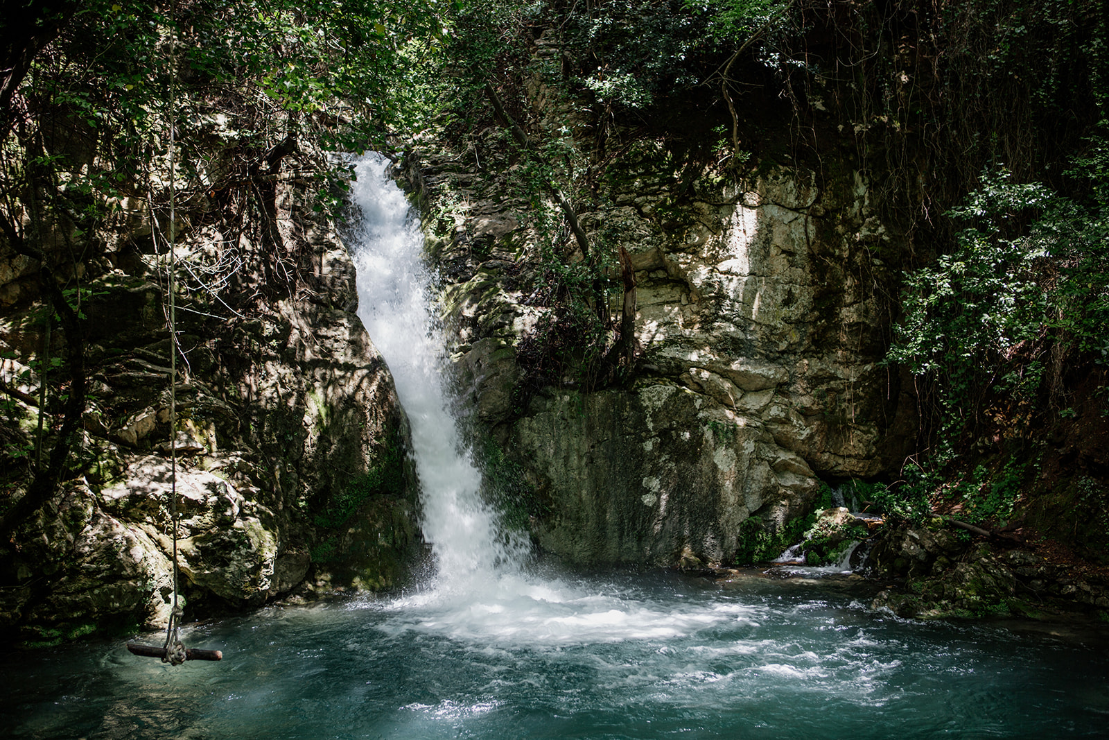 waterfall into plunge pool turquoise water yoga holiday montenegro