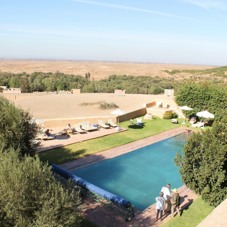 heated outdoor pool and lounge area yoga holiday Marrakech