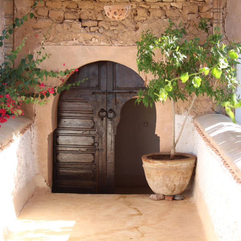 moroccan style door, walls and plant pots yoga holiday Marrakech