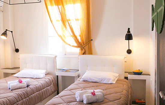 twin beds santorini bedroom