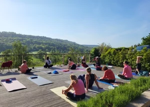 people doing yoga on deck in peak district