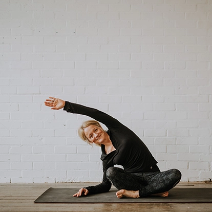 yoga teacher doing pose for photoshoot