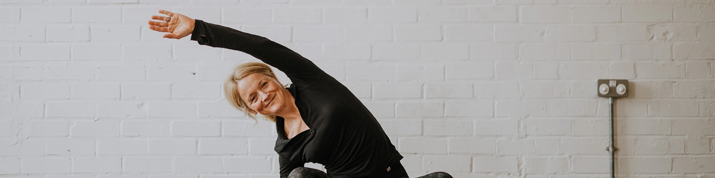 yoga teacher doing a yoga pose for photo shoot