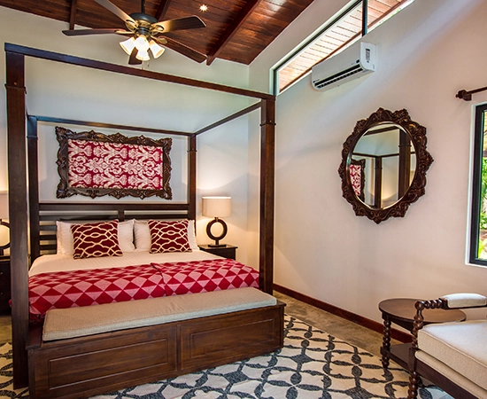 double bed with four poster