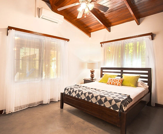 double bed in villa in nosara